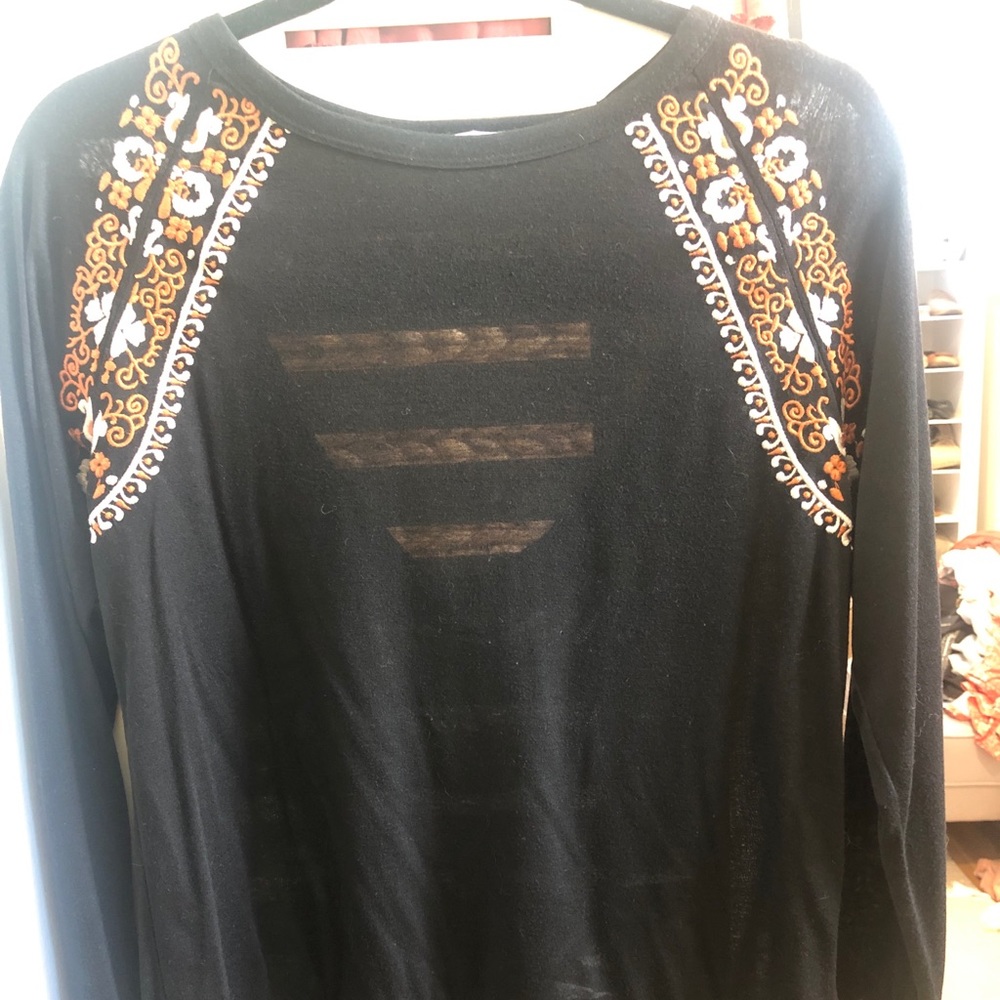 Black shirt with rust and cream stitch detail